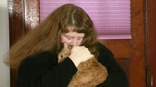 Beauty Queen Butcher - Phyllis Rhona Brody holding longhair ginger tabby cat Eartha