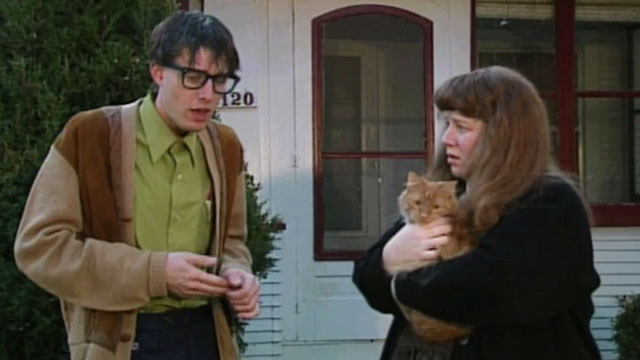 Beauty Queen Butcher - Phyllis Rhona Brody holding longhair ginger tabby cat Eartha with Cameron Steve Kollin