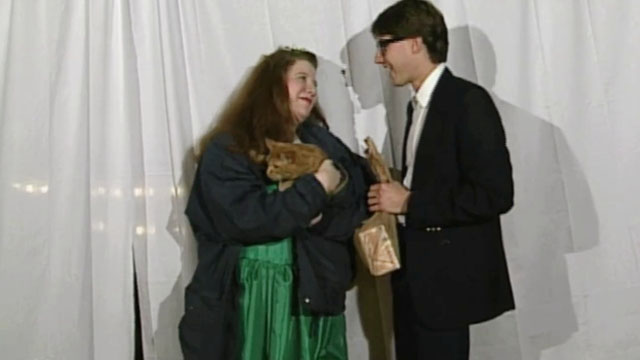 Beauty Queen Butcher - Phyllis Rhona Brody holding longhair ginger tabby cat Eartha with Cameron Steve Kollin