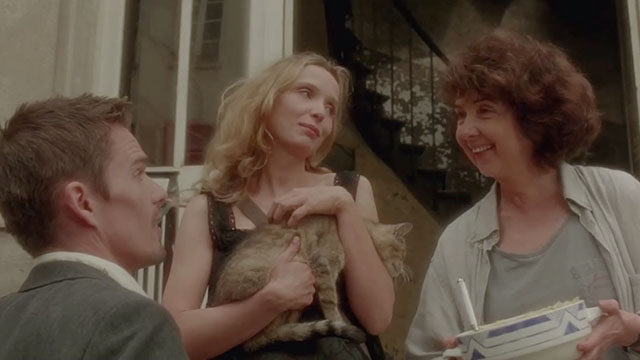 Before Sunset - tabby cat held by Celine Julie Delpy with Jesse Ethan Hawke and neighbor