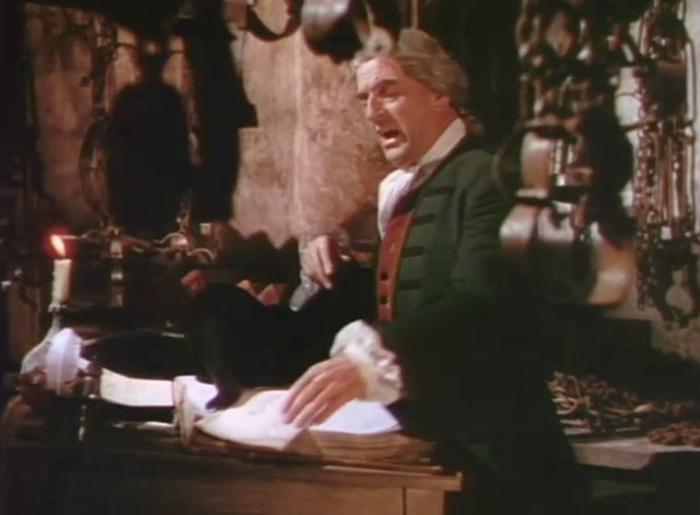 The Beggar's Opera - black cat on desk with Mr. Lockit Stanley Holloway
