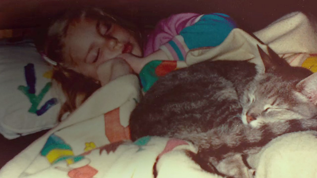 Beginners - photo of girl sleeping with tabby cat on bed