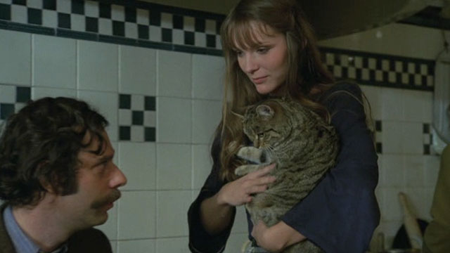 Belle - Marie Stéphane Excoffier bringing brown tabby cat Juliette to Mathieu Jean-Luc Bideau