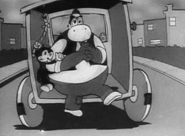 Bimbo's Express - cartoon black cat and Harold Hippo on back of wagon