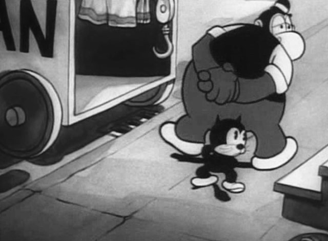 Bimbo's Express - cartoon black cat and Harold Hippo pacing on sidewalk