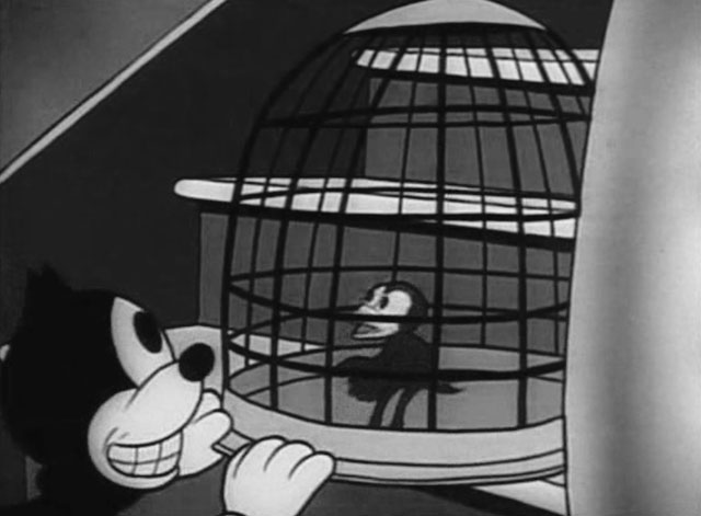 Bimbo's Express - cartoon black cat looking into birdcage