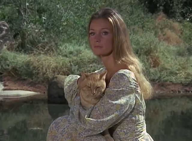 Black Noon - ginger tabby cat held by Deliverance Yvette Mimieux by pond