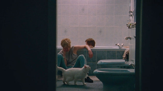 Blue Jean - Rosy McEwan in bathroom and nephew taking cat with white cat