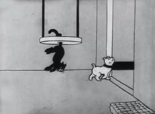 Bobby Bumps' Fight - a cartoon black cat hanging as punching bag as bulldog Fido walks away with nose in air