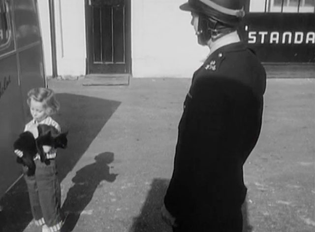 Bond of Fear - policeman John Horsley with Ann Marilyn Baker holding black cat outside camper