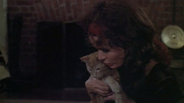 Born to Win - Parm Karen Black cuddling with ginger tabby cat
