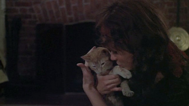 Born to Win - Parm Karen Black cuddling with ginger tabby cat