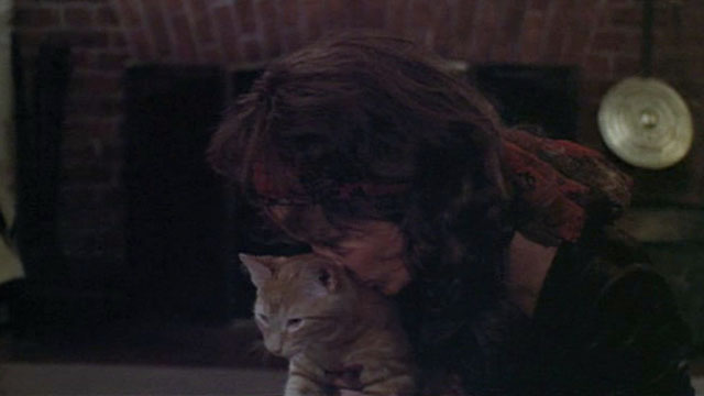 Born to Win - Parm Karen Black cuddling with ginger tabby cat