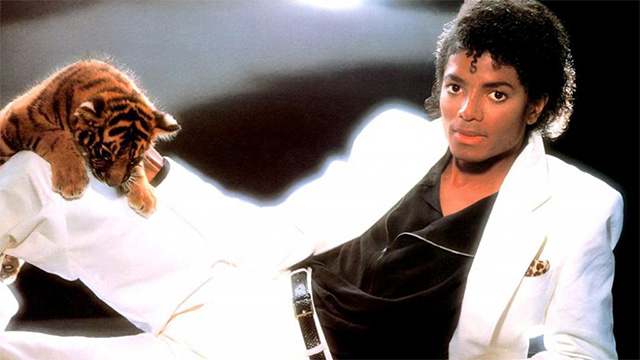 Boy - Thriller Michael Jackson with baby tiger