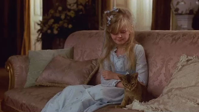 The Bride - Abyssinian kitten on sofa with girl Annie Roddam