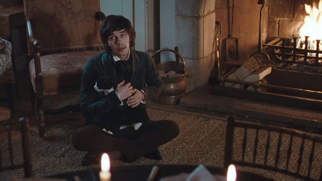 Bright Star - Keats Ben Whishaw sitting on floor with tuxedo cat Topper
