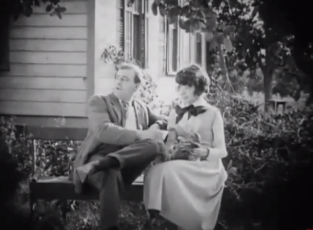 The Busher - Mazie Colleen Moore holding tabby kitten on bench with Jay Morley