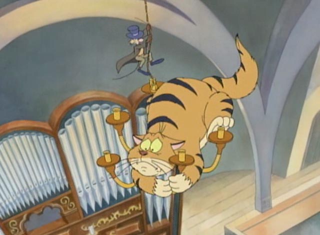 Buster & Chauncey's Silent Night - orange tabby cat Dolf hanging on chandelier