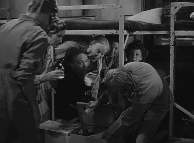 Caged - Marie Allen Eleanor Parker with tiny tabby kitten Fluff in foot locker surrounded by female inmates