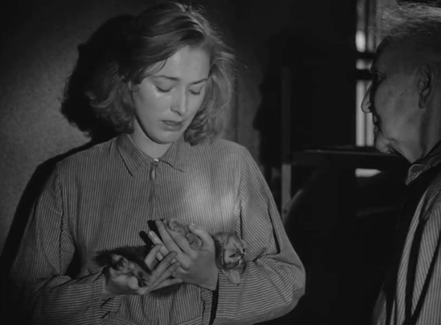 Caged - Marie Allen Eleanor Parker  holding lifeless body of tiny tabby kitten Fluff
