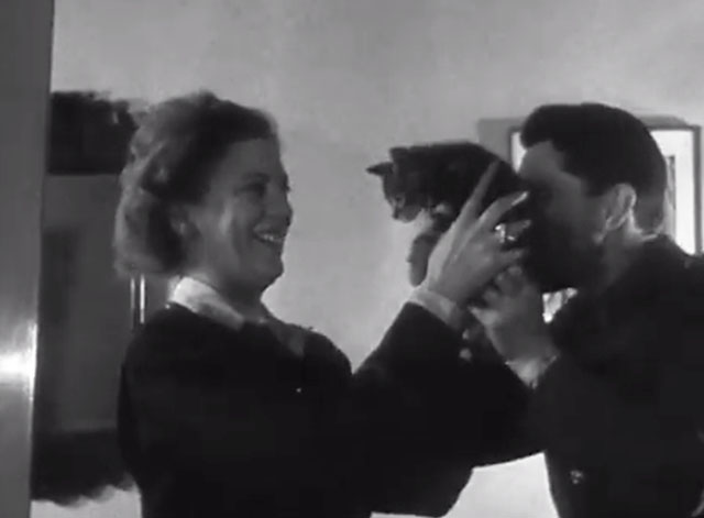 Candid Camera with Lee Miller - holding up tabby kitten