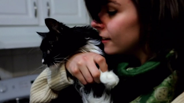 Capture Kill Release - Jennifer Fraser holding tuxedo Norwegian Forest Cat Mittens Snorri