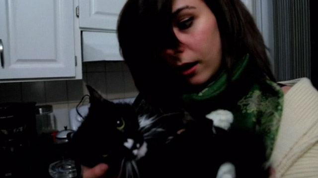 Capture Kill Release - Jennifer Fraser still holding tuxedo Norwegian Forest Cat Mittens Snorri