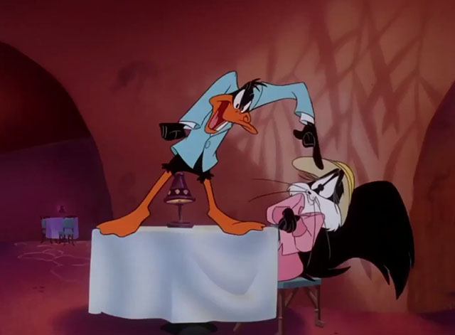 Carrotblanca - Sam Daffy Duck pointing at Kitty Ketty Penelope at table