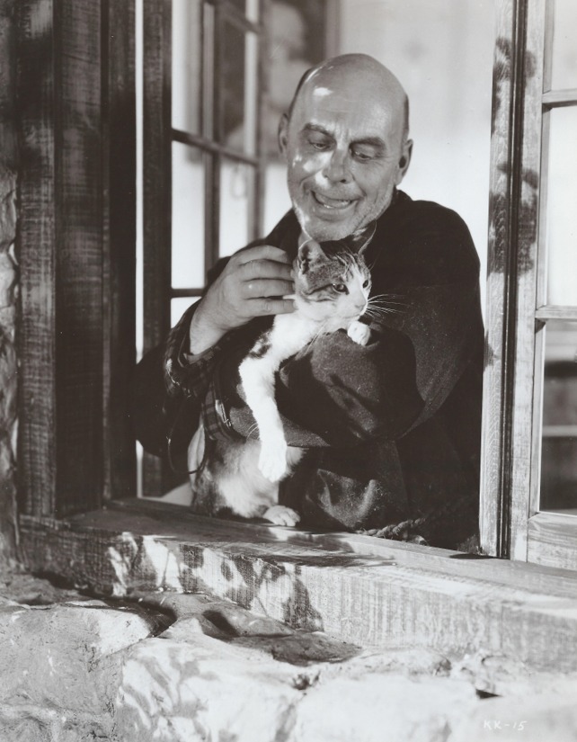 The Case of the Black Cat - Clinker cat in caretaker's arms