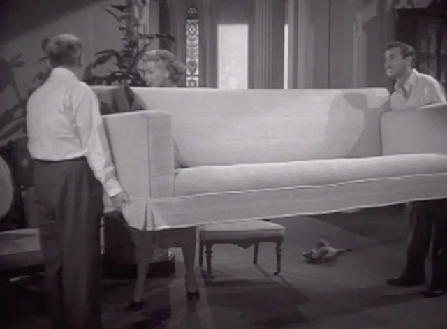 Cass Timberlane - Cass Timberlane Spencer Tracy moving couch with Virginia Lana Turner while tabby cat Cleo lies on floor