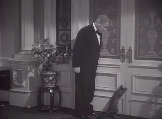 Cass Timberlane - Cass Timberlane Spencer Tracy with tabby cat Cleo pawing at front door