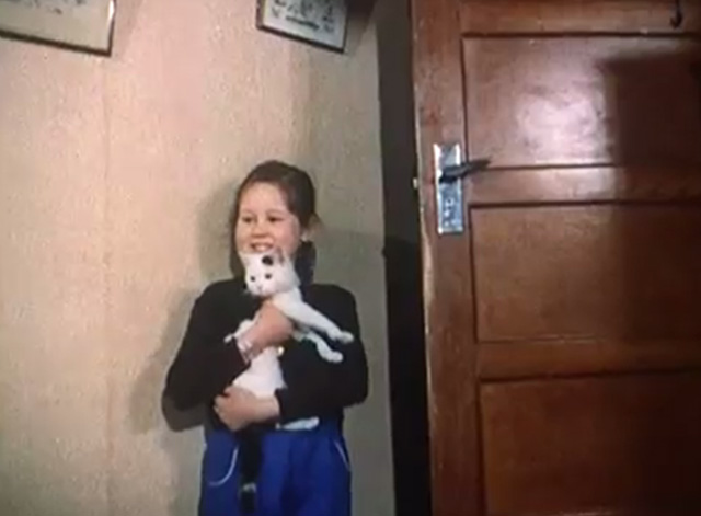 Cat and Mice - black and white cat Debby carried in door by little girl