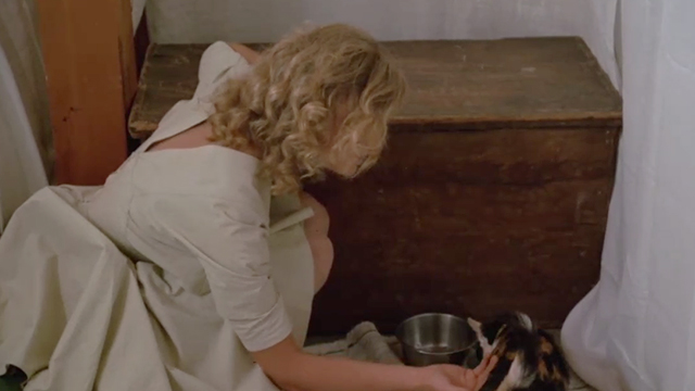 Catchfire - Anne Jodie Foster petting tortoiseshell cat Frida while drinking
