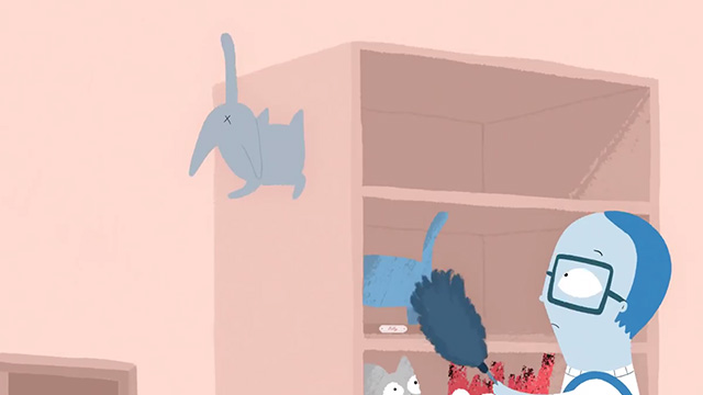 Catherine - gray cat jumping into bookcase
