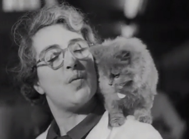 Cat Show 1948 - kitten sitting on woman's shoulder