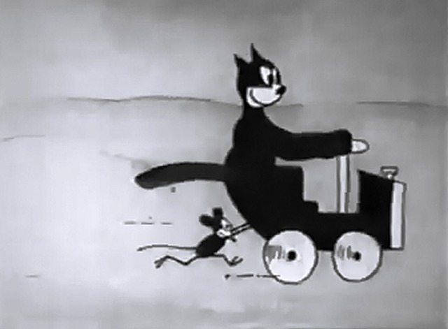 A Cat's Life - cartoon cat in car with mouse pushing