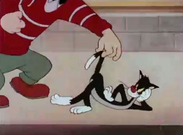 The Cat That Hated People - sulking cartoon black cat about to be kicked by man