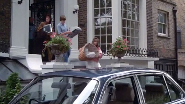 The Chain - Rosemary Charlotte Long carrying wicker basket holding longhair white cat Lady Diana