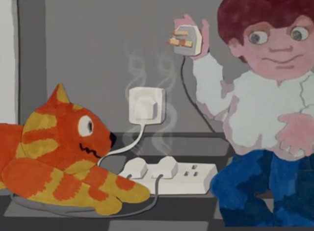 Charley Says - Overloading Sockets - cartoon ginger tabby cat Charley with boy Tony looking at power strip