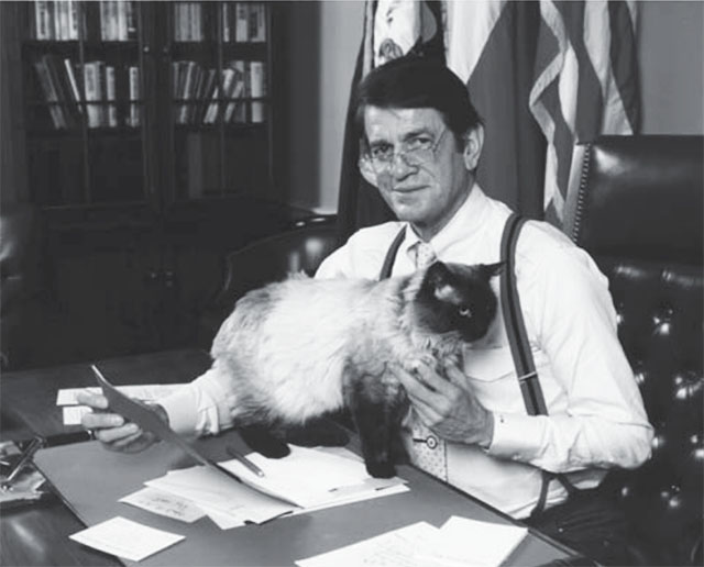 Charlie Wilson's War - with Himalayan cat Khyber in his office