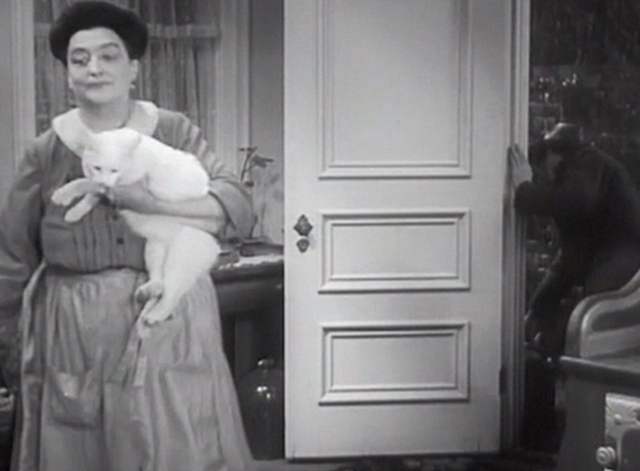 Chasing Yesterday - Therese Helen Westley turning away from door with white cat Whitey