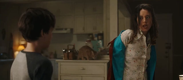 Child's Play - Andy Gabriel Bateman and his mother Karen Aubrey Plaza in apartment with ginger tabby cat Mickey Rooney