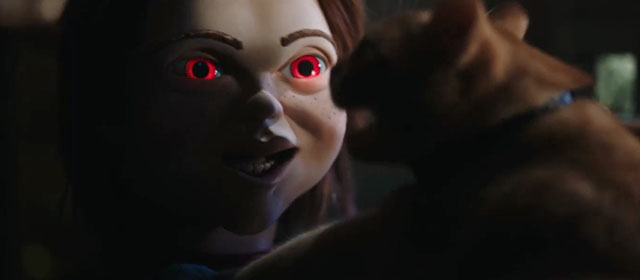 Child's Play - Chucky doll holding ginger tabby cat Mickey Rooney by throat