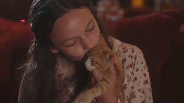 Christmas at the Catnip Cafe - little girl Olivia Mila Morgan holding ginger and white tabby kitten Noel