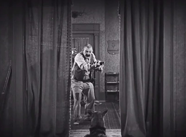 Clash of the Wolves - Alkaline Bill Heinie Conklin waving tuxedo kitten in front of Lobo Rin Tin Tin
