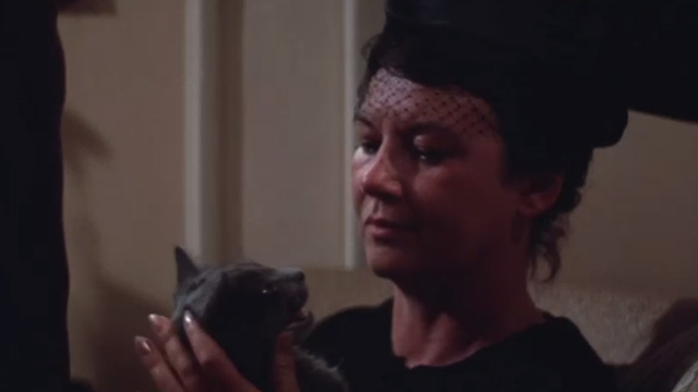 Class of '44 - woman holding gray cat