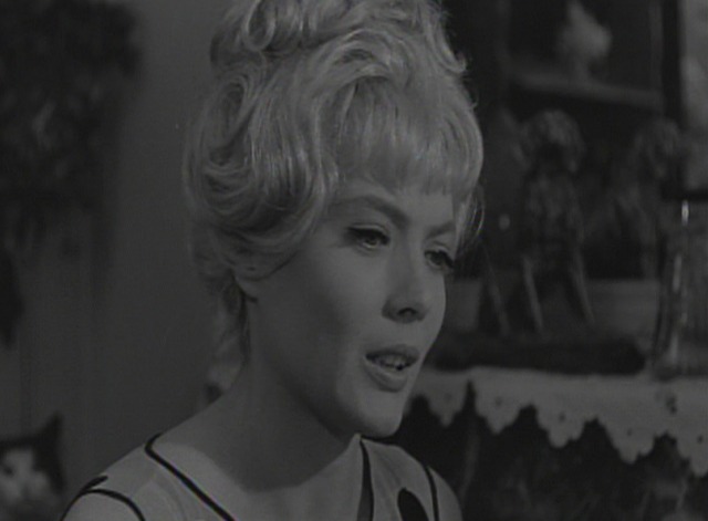 Cleo From 5 to 7 - black and white cat behind Cleo