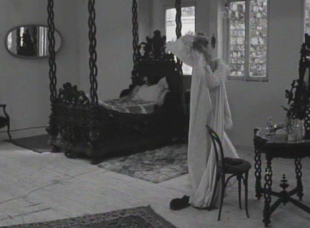 Cleo From 5 to 7 - black kitten plays with Cleo's dressing gown