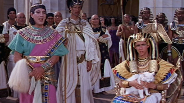 Cleopatra - Ptolemy Richard O'Sullivan holding white long haired cat with Pothinus Gregoire Aslan