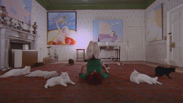 A Clockwork Orange - Cat Lady Miriam Karlin doing stretching exercises surrounded by numerous cats